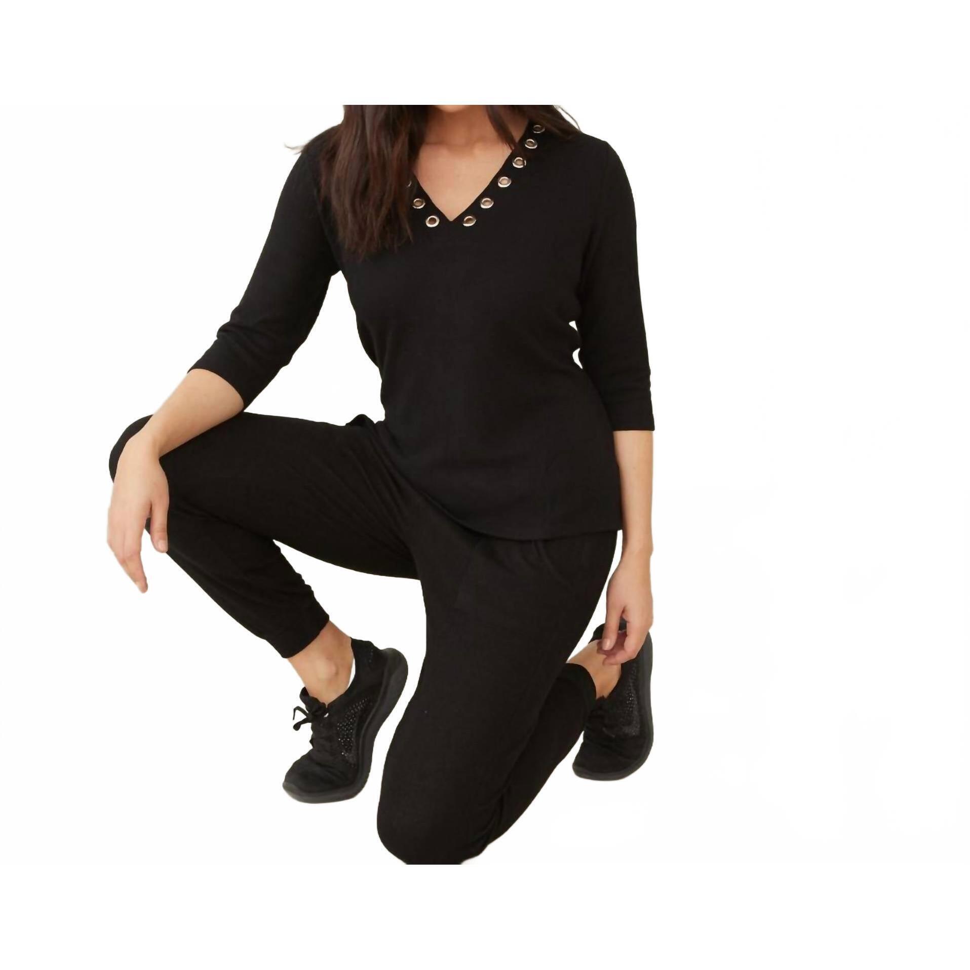 New French Kyss Soft Stretch Grommet V Neck Top In Black